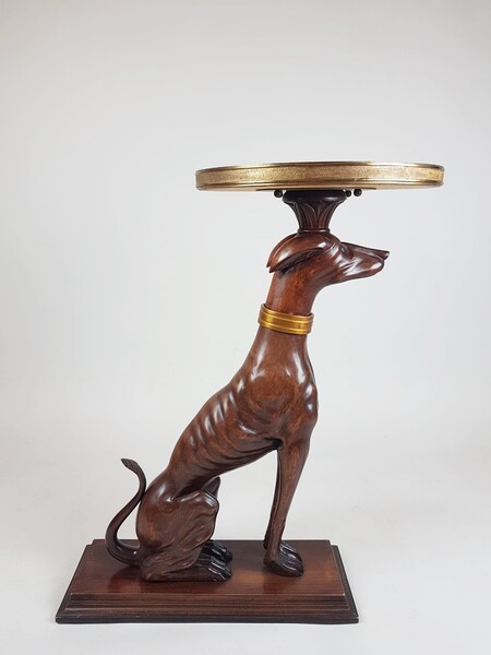 Art Deco pedestal table, marble tablet held by a carved wooden greyhound, circa 1940