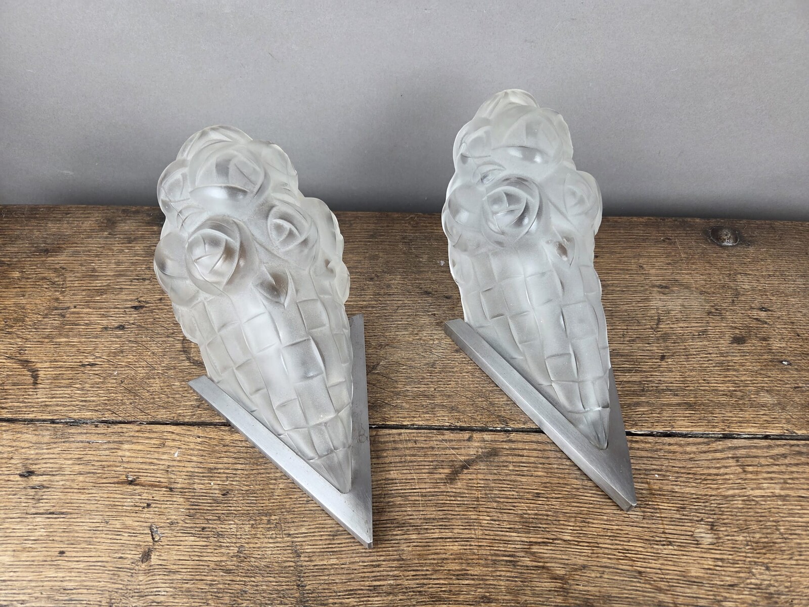 Degué, pair of molded glass sconces, circa 1930