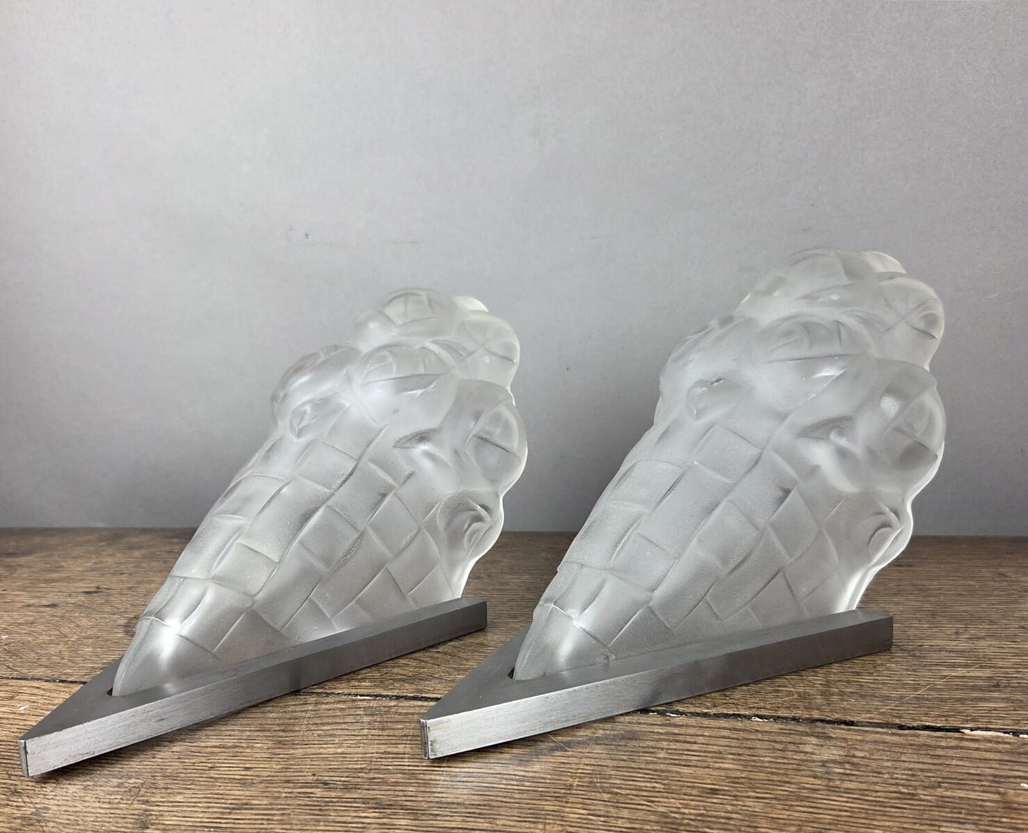 Degué, pair of molded glass sconces, circa 1930