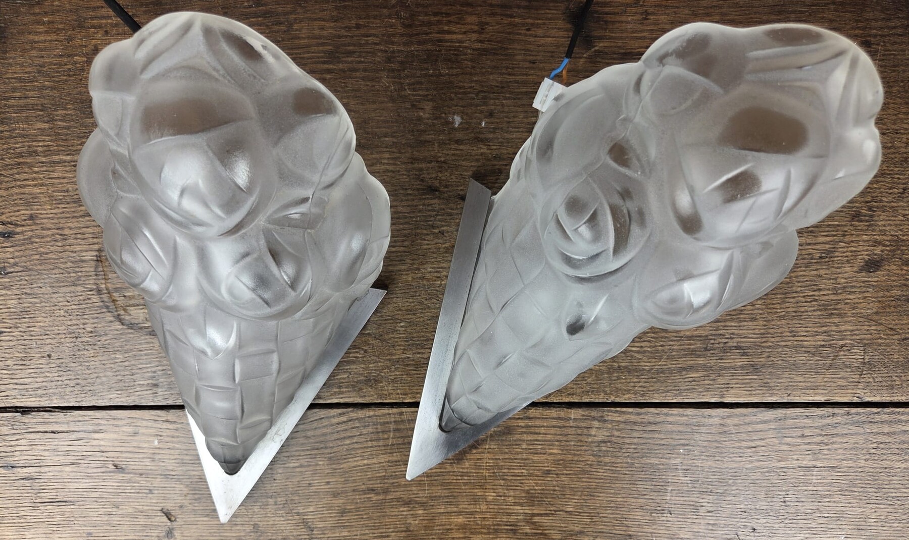 Degué, pair of molded glass sconces, circa 1930