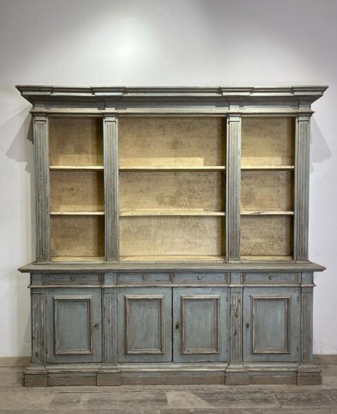 Double body bookcase in patinated wood, partly 19th