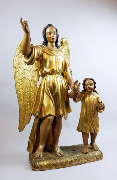 Guardian angel and child in gilded and polychromed wood, 18th