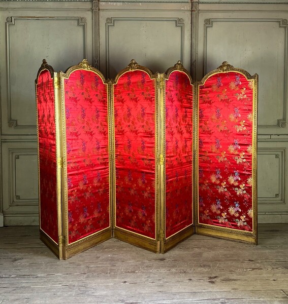 Louis XVI style screen in carved and gilded wood