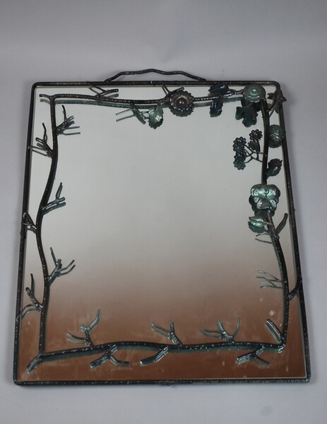 Mirror with handmade floral decorations