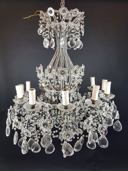Pair of chandeliers with tassels and glass florets, early 20th. Price for the pair.