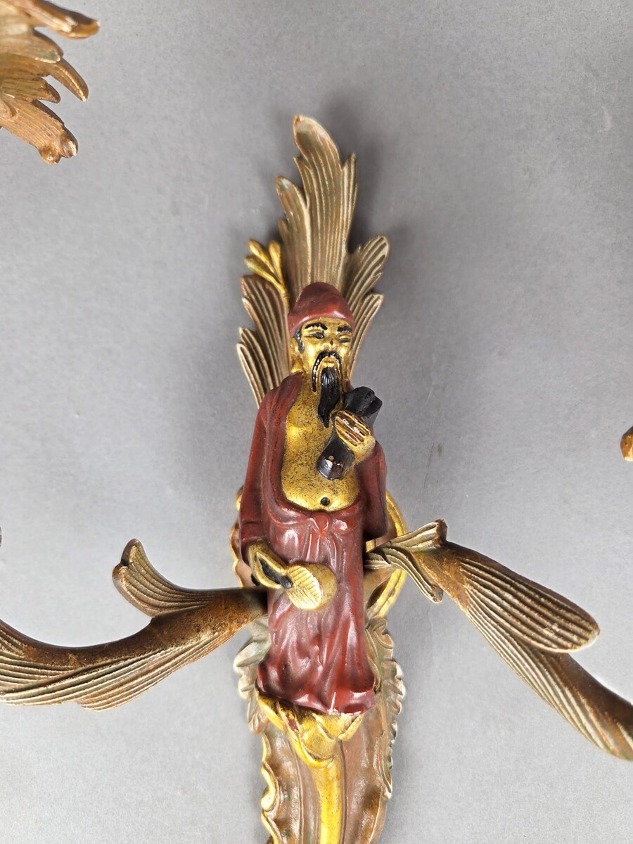 Pair of polychrome bronze sconces in the Maison Janssen style
