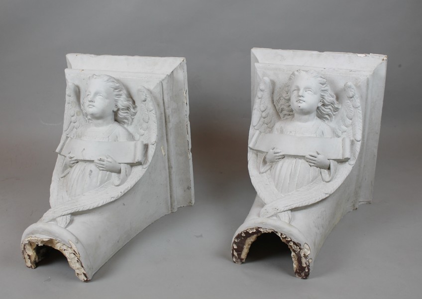 Plaster console decorated with angels