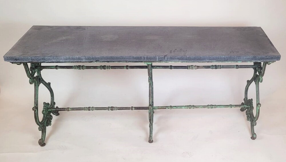 Wrought iron table and blue stone shelf
