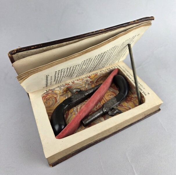 18th century leather book forming a pistol case, circa 1840