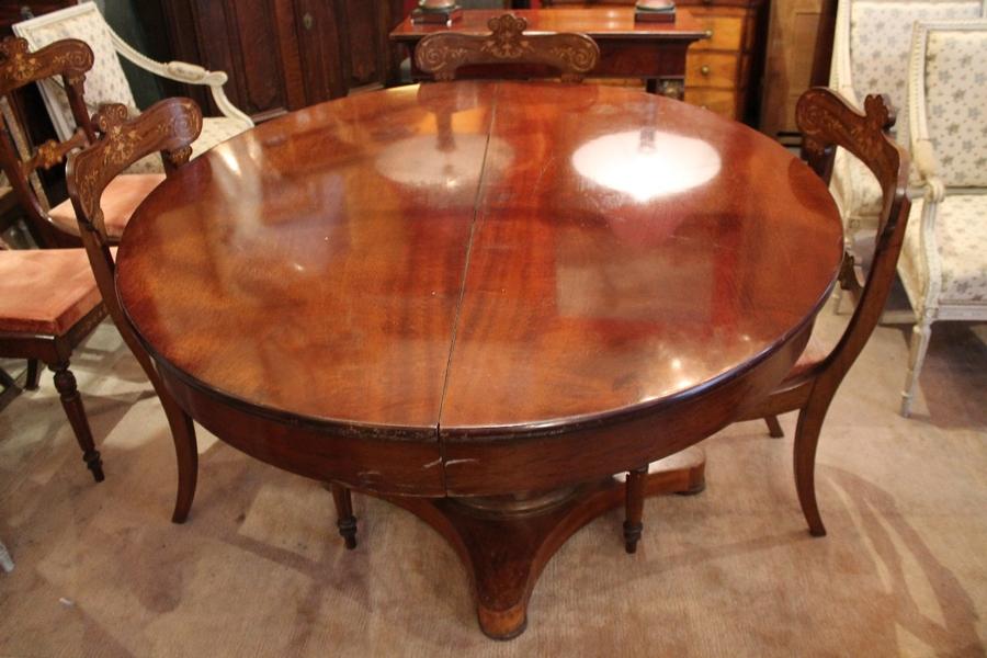 19th C. Mahogany dining table complete with extensions