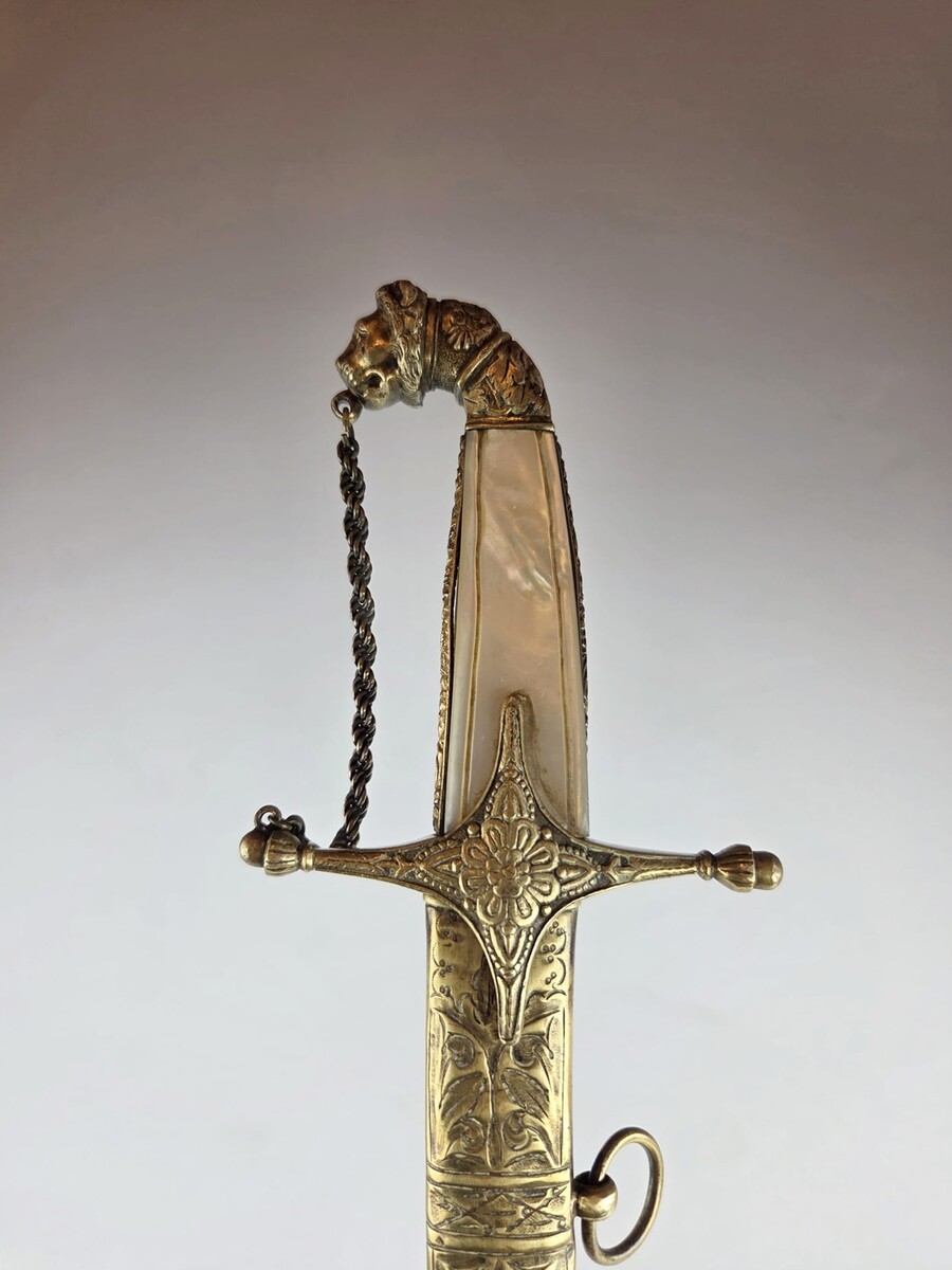 1st Empire child's saber, nice work on the scabbard.