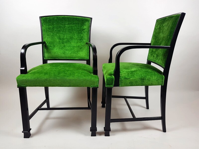 Austria, circa 1920, pair of black lacquered wooden armchairs