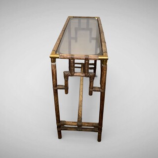 Bamboo console table with brass corners