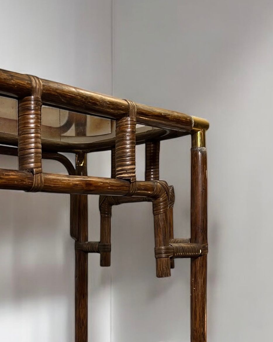 Bamboo console table with brass corners