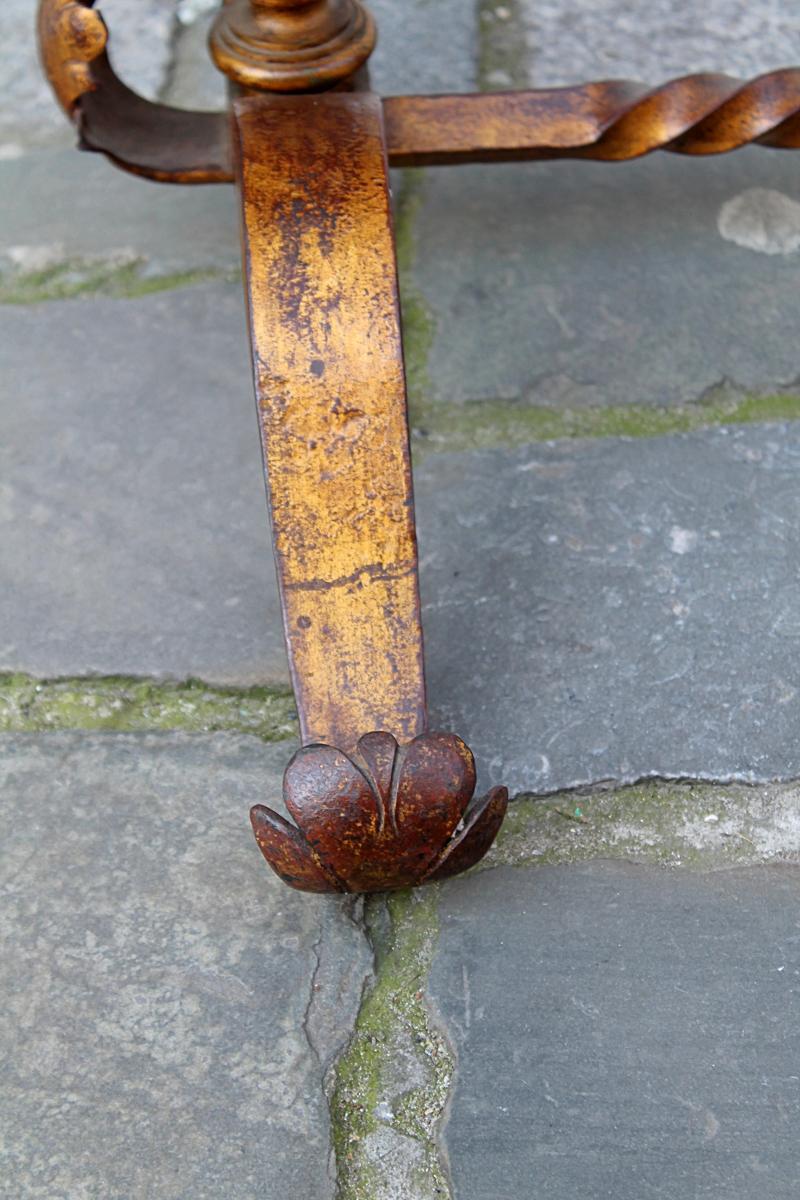 Bronze coffee table with eglomised glass top, circa 1940