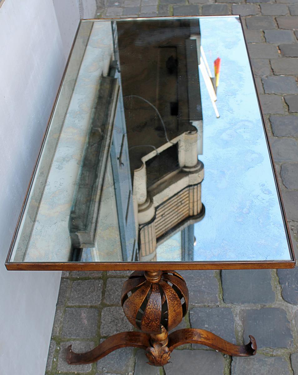 Bronze coffee table with eglomised glass top, circa 1940
