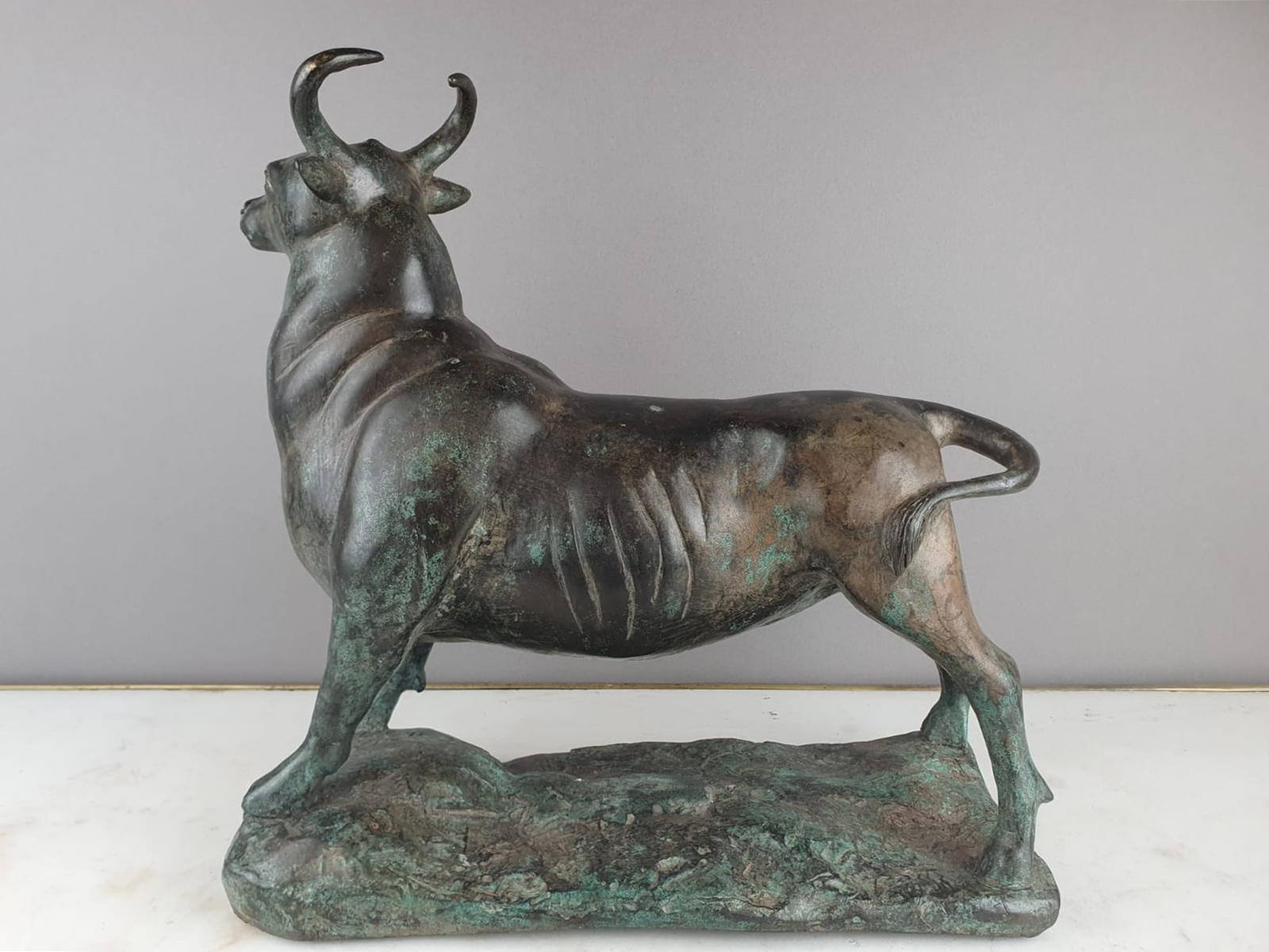 Bronze with green patina 