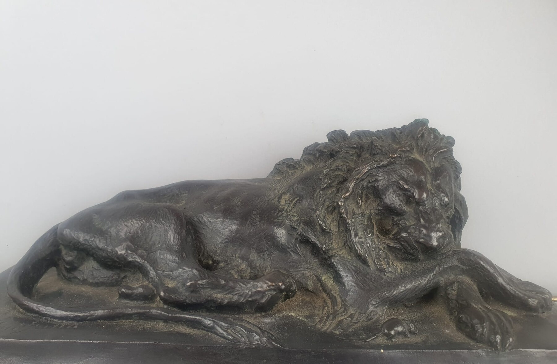 Bronze with green patina on marble base 