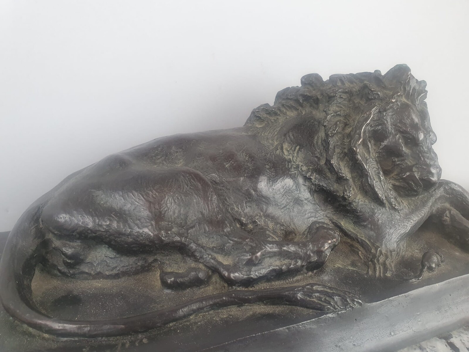 Bronze with green patina on marble base 