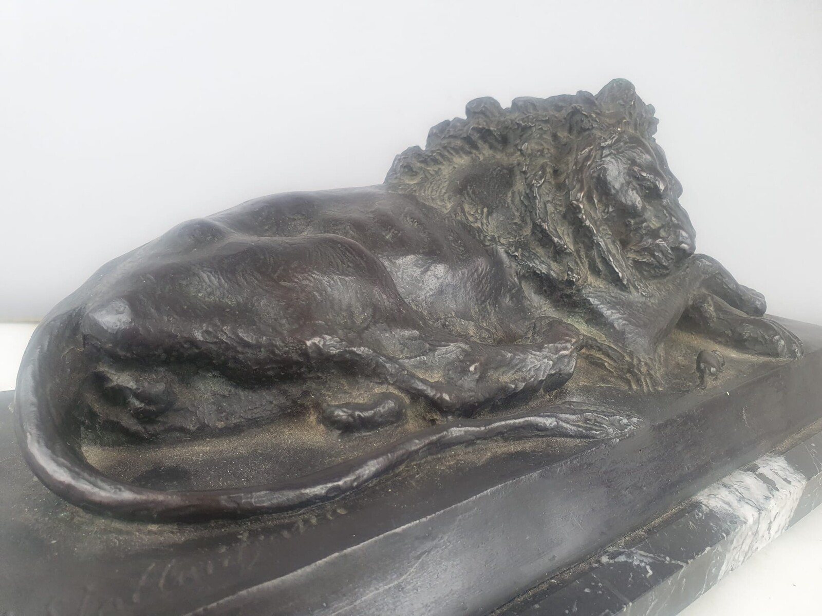 Bronze with green patina on marble base 