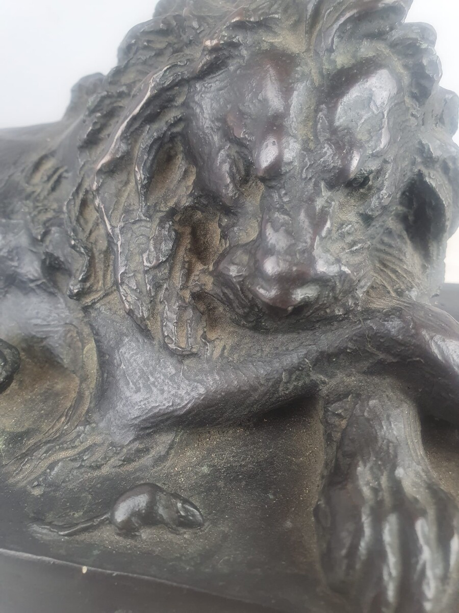 Bronze with green patina on marble base 