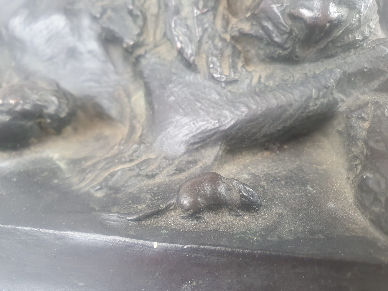 Bronze with green patina on marble base 