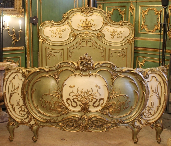 carved and giltwood Louis XV style bed