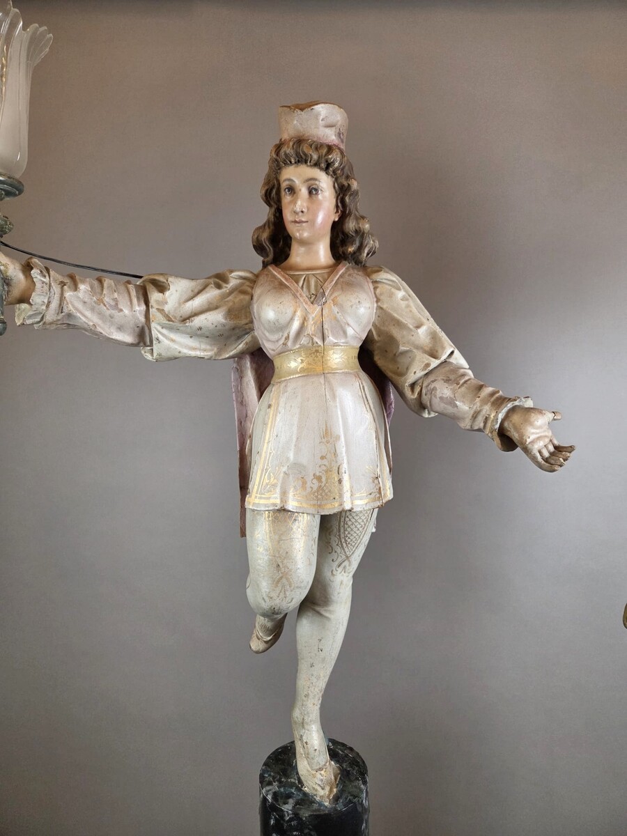 Carved and polychromed wood torchères on cast-iron columns, late 19th century