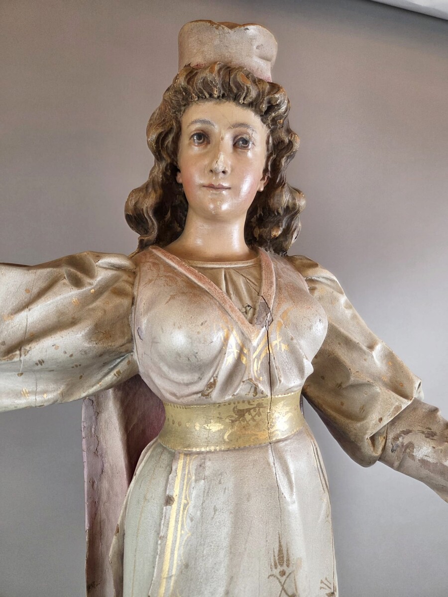 Carved and polychromed wood torchères on cast-iron columns, late 19th century