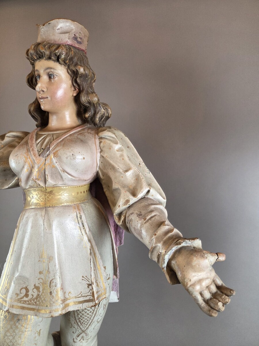 Carved and polychromed wood torchères on cast-iron columns, late 19th century