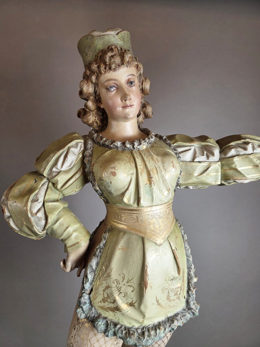 Carved and polychromed wood torchères on cast-iron columns, late 19th century