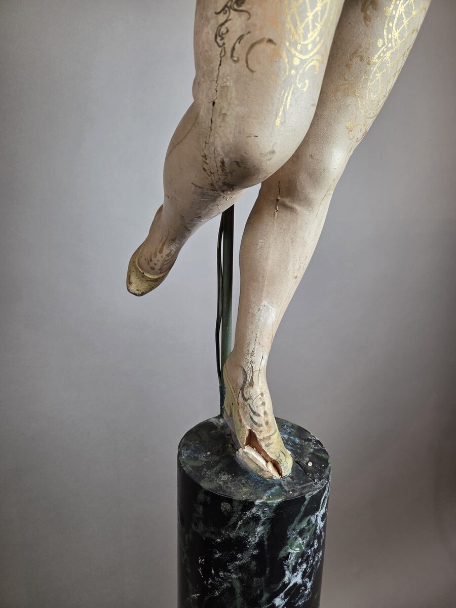 Carved and polychromed wood torchères on cast-iron columns, late 19th century