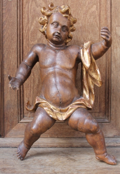 Carved wooden putto, 18th C.