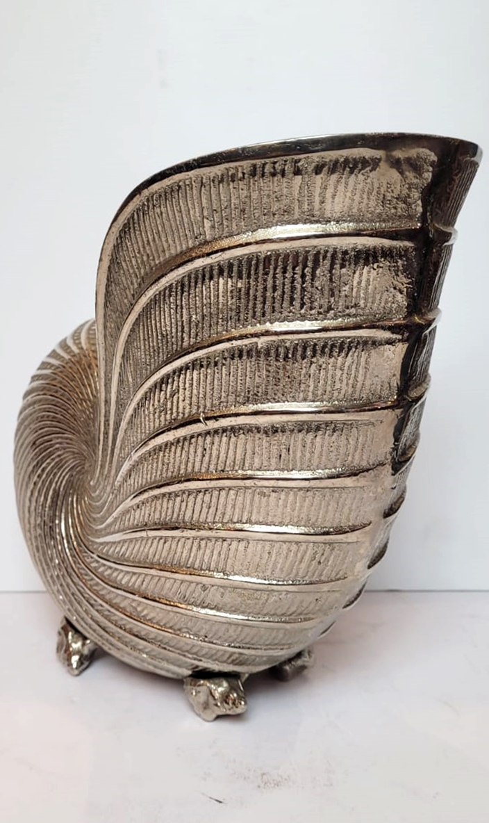 Champagne bucket in the shape of a nautilus in silver metal