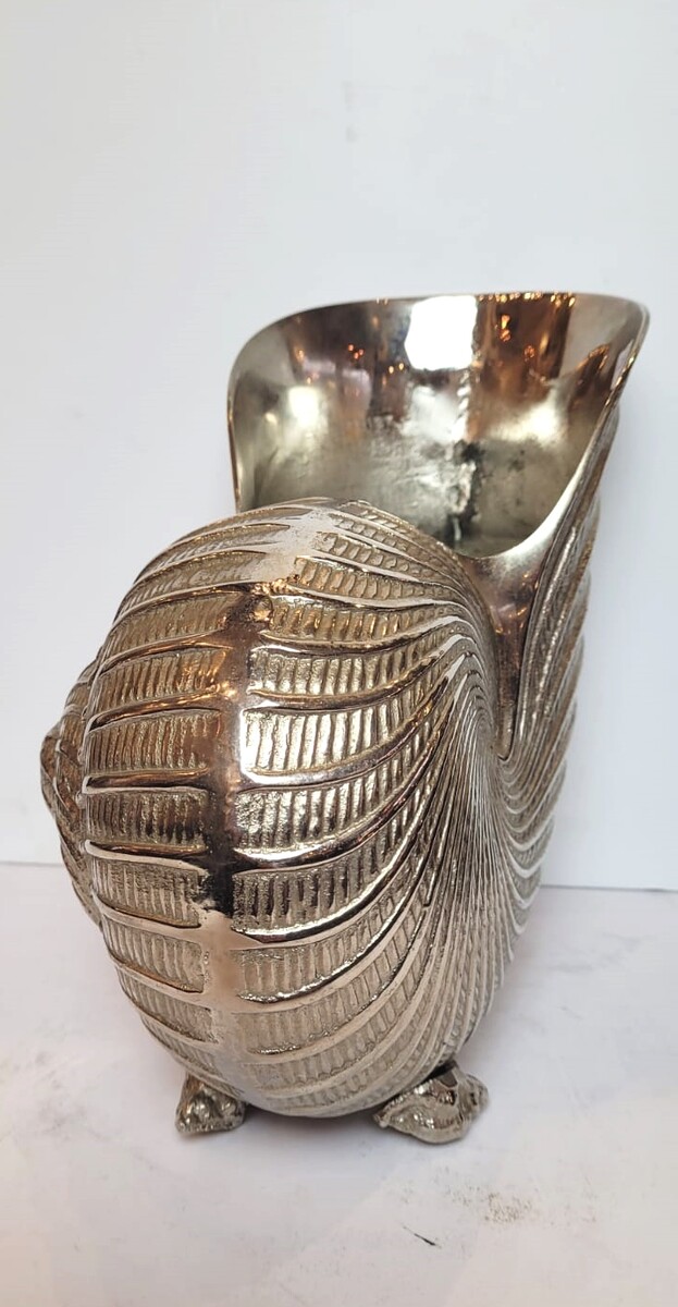 Champagne bucket in the shape of a nautilus in silver metal