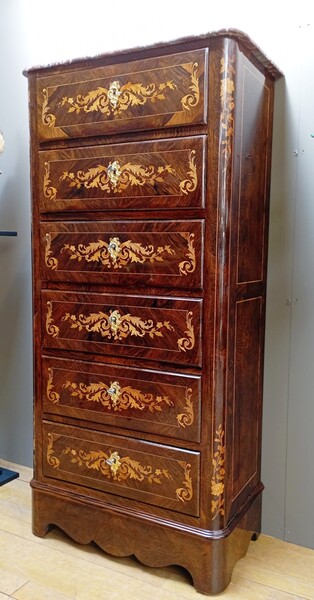 Charles X semainier in inlaid rosewood opening with 6 rows of drawers