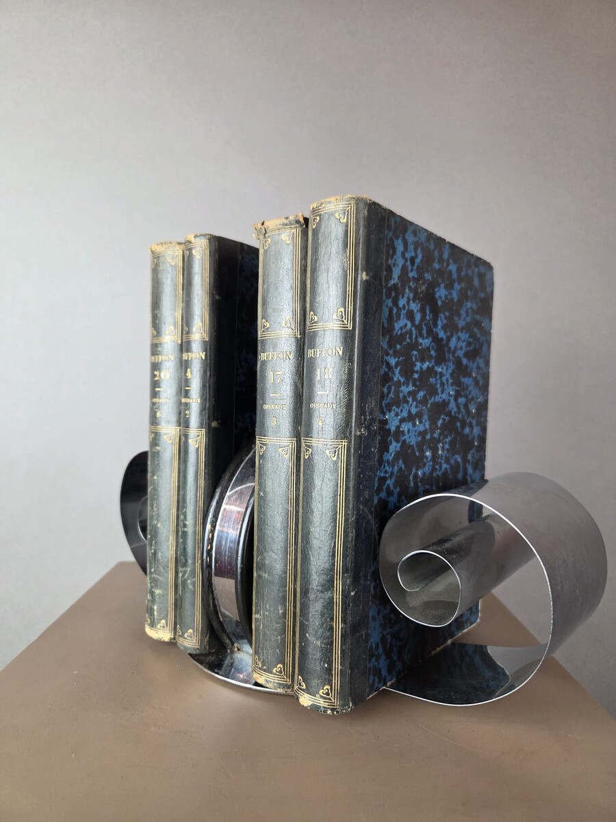 chrome-plated metal and lacquered wood bookend, circa 1935