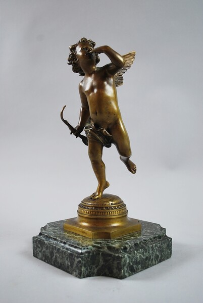 Cupid bronze on marble base, signed Itasse