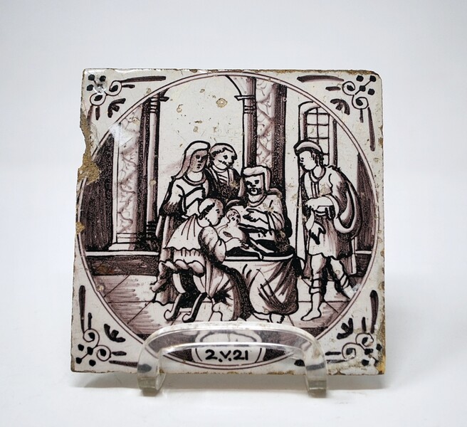 Delft earthenware tile decorated with a circumcision scene, 18th
