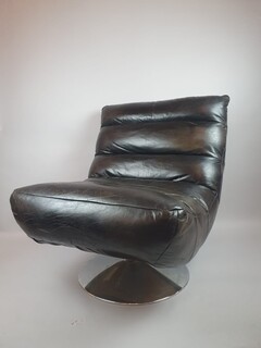 Designer armchair in leather and chrome metal, 20th century