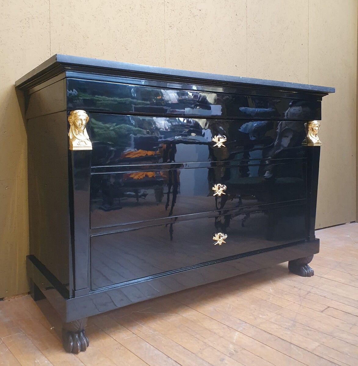 Empire chest of drawers in black lacquered wood, 19th century