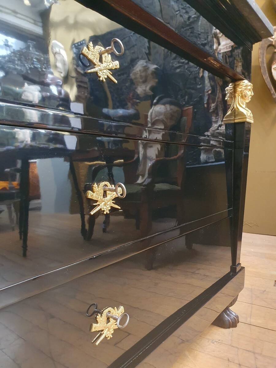 Empire chest of drawers in black lacquered wood, 19th century