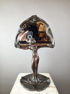 F. Flora, Art Nouveau mirror in patinated spelter