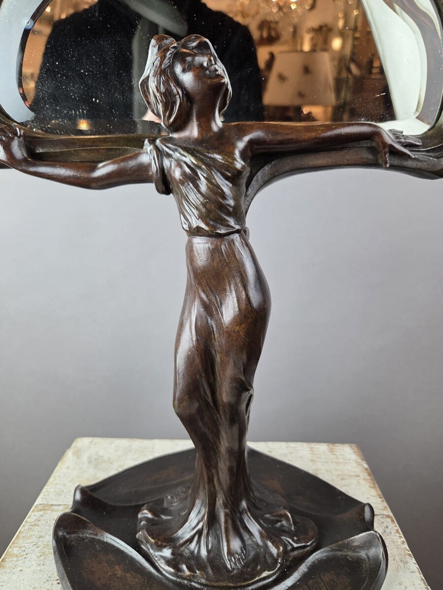 F. Flora, Art Nouveau mirror in patinated spelter