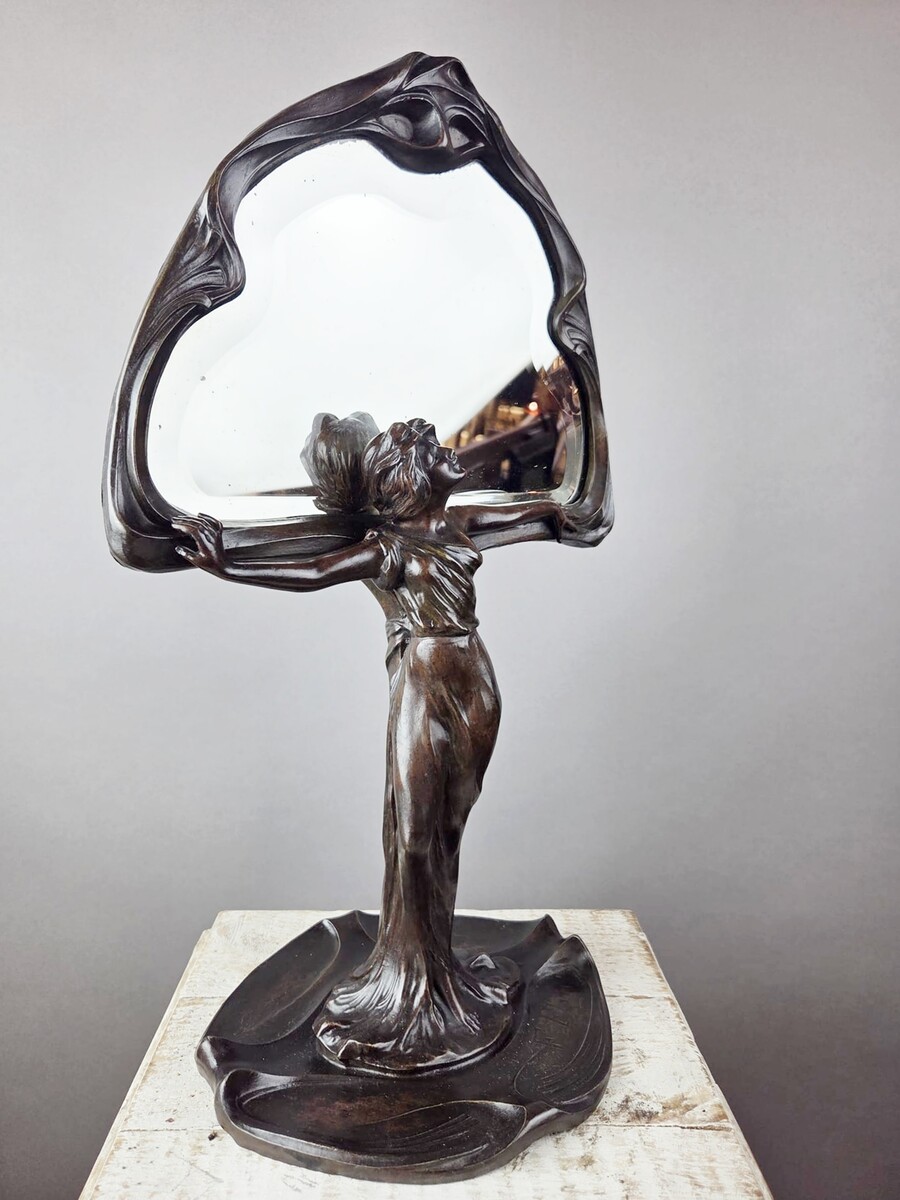 F. Flora, Art Nouveau mirror in patinated spelter