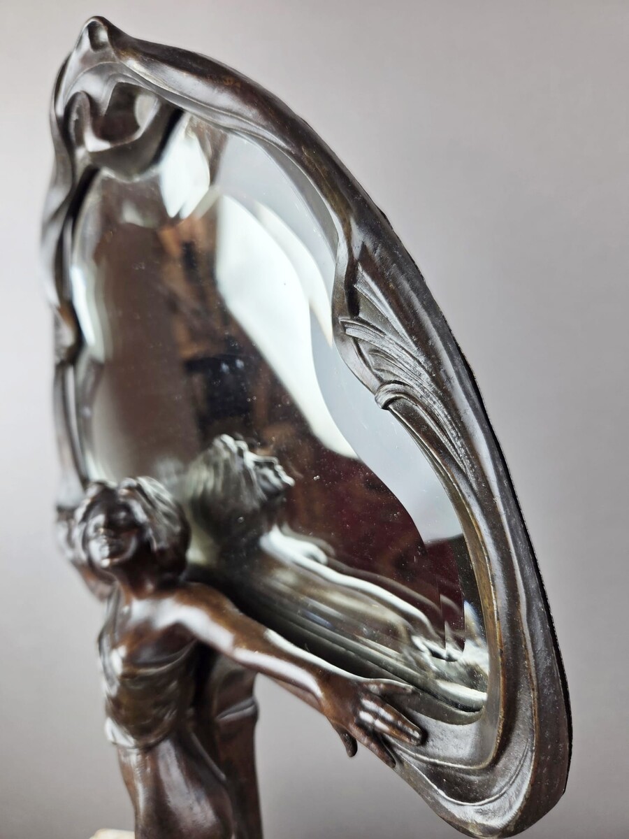F. Flora, Art Nouveau mirror in patinated spelter
