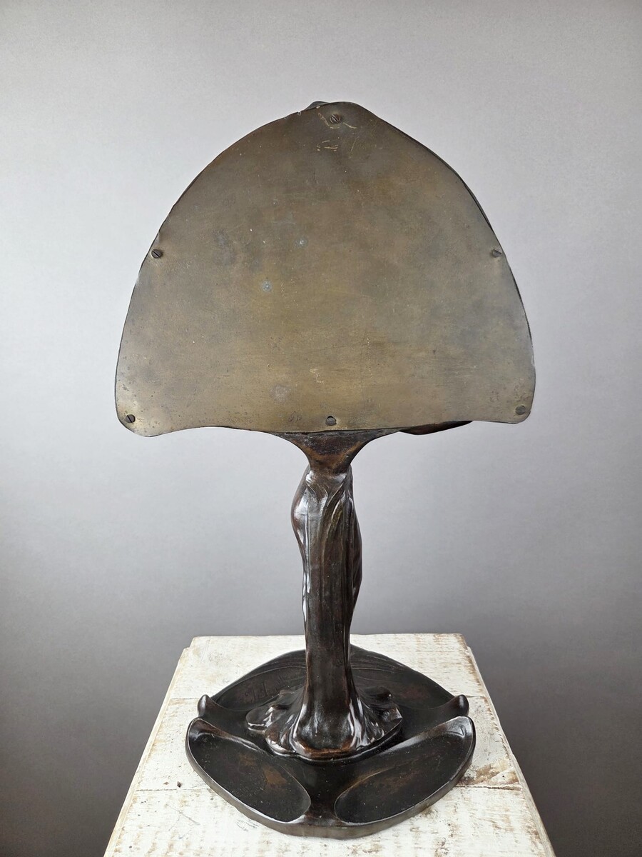 F. Flora, Art Nouveau mirror in patinated spelter