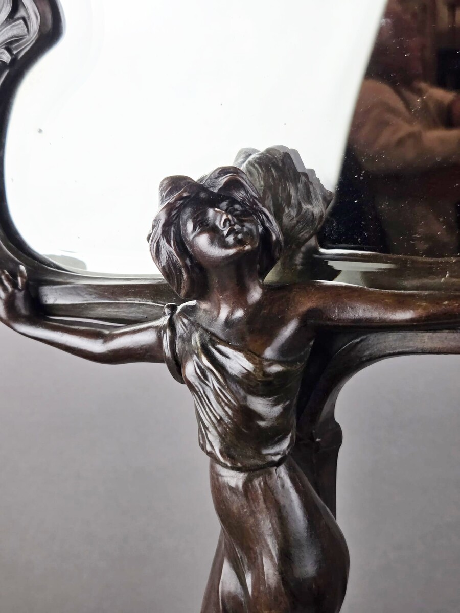 F. Flora, Art Nouveau mirror in patinated spelter