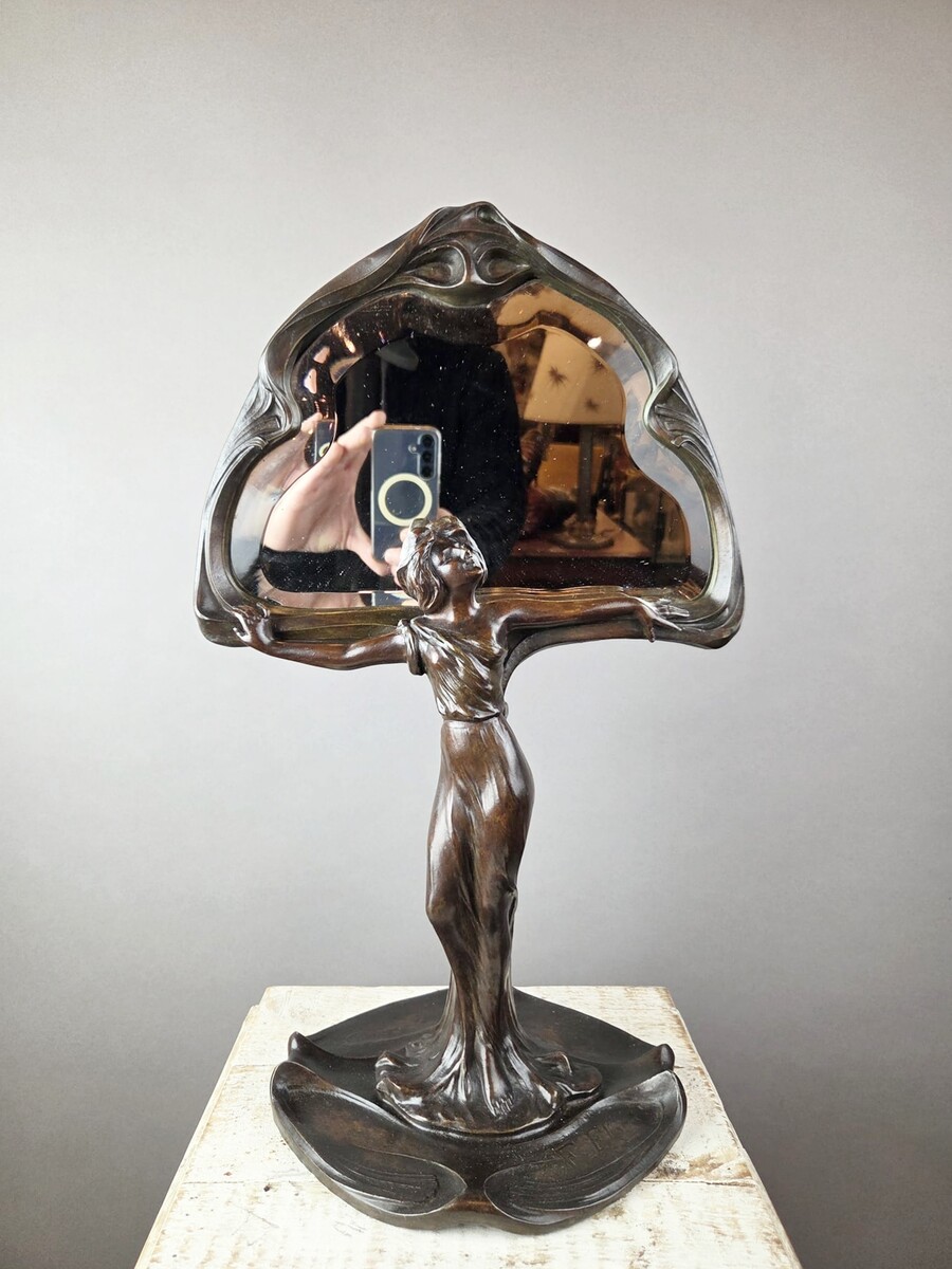 F. Floria, Art Nouveau mirror in patinated spelter