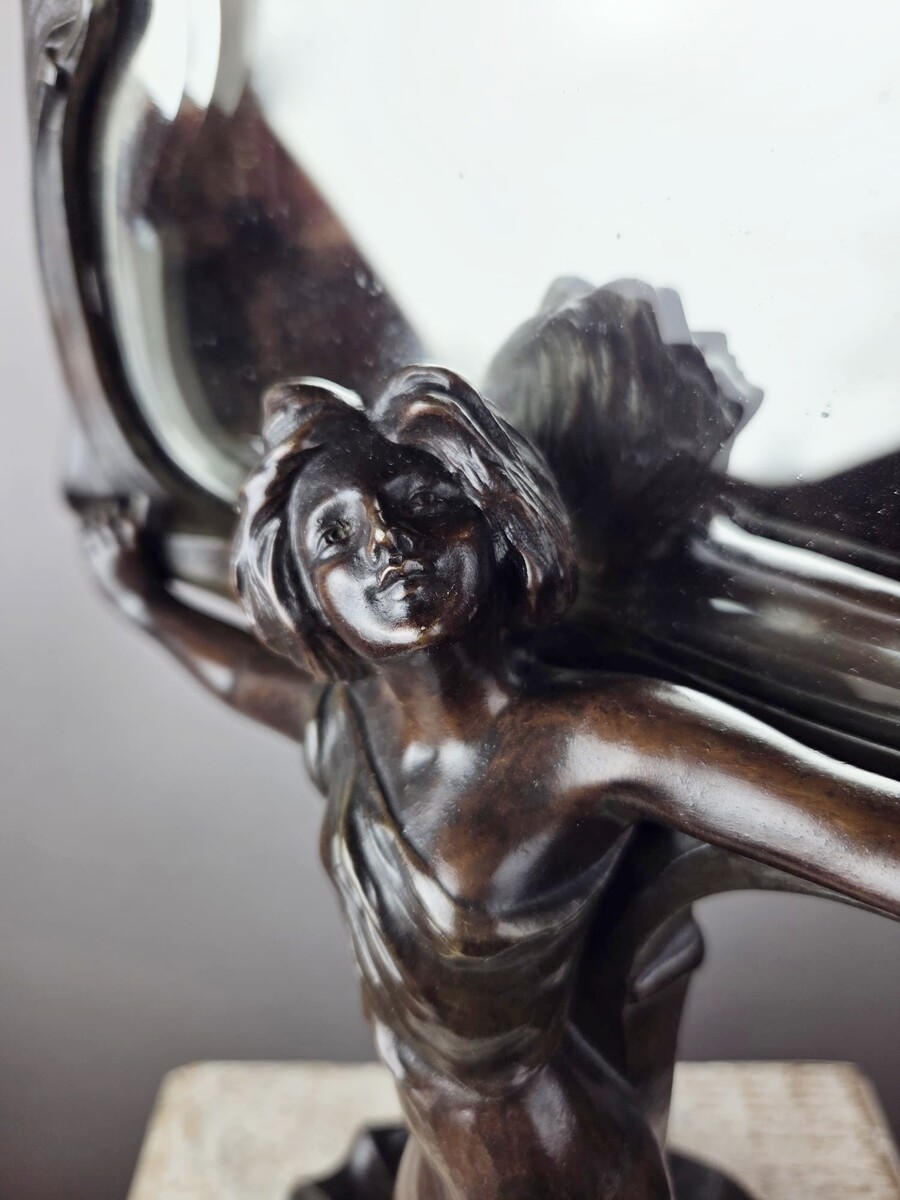 F. Floria, Art Nouveau mirror in patinated spelter